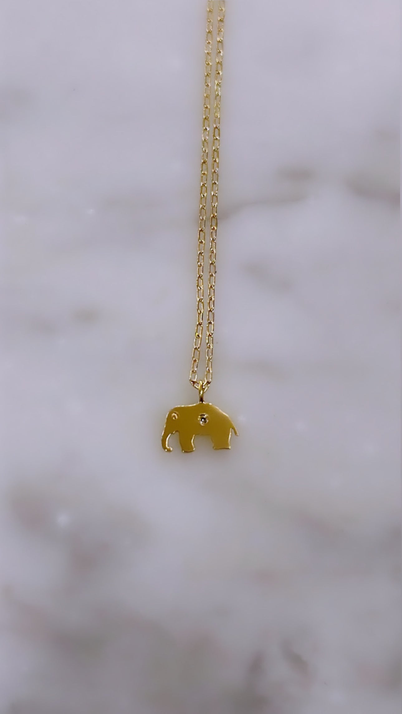 Collier or jaune éléphant